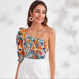 Never worn one shoulder colorful top